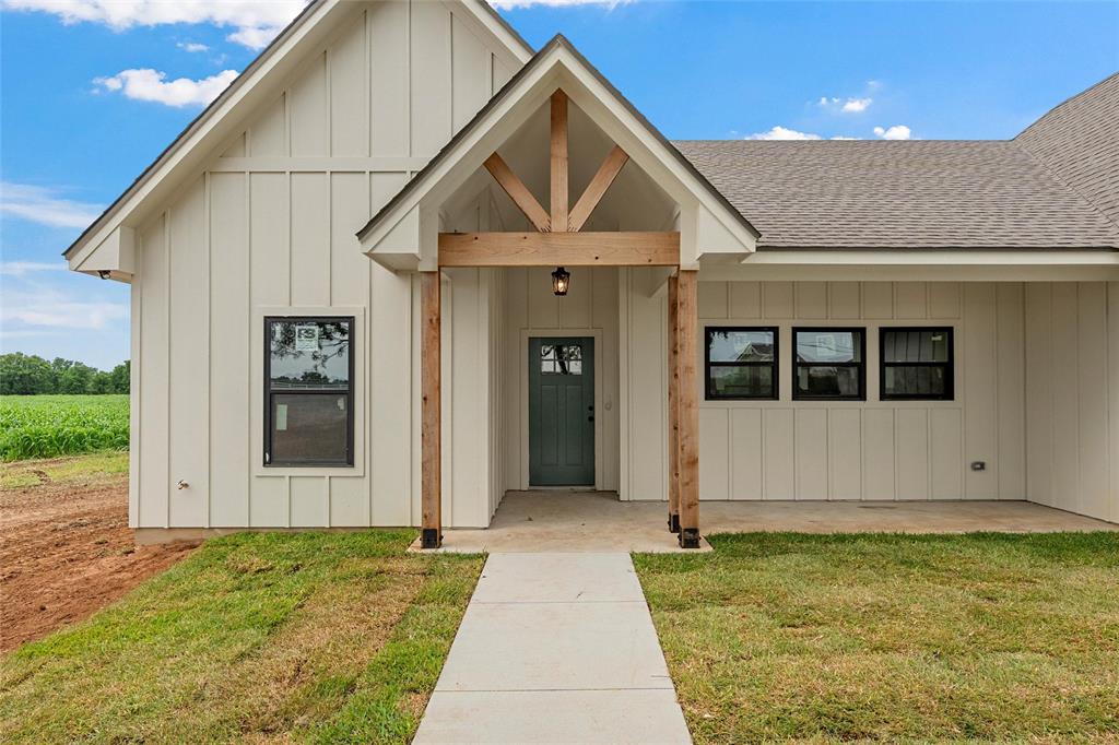 5200 Bogey Lane Waco, TX 76708 - Photo 4 of 37 a front view of a house with a yard