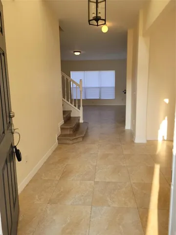 a view of a livingroom with a staircase