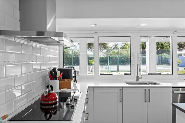 a bedroom with a bed and a chair