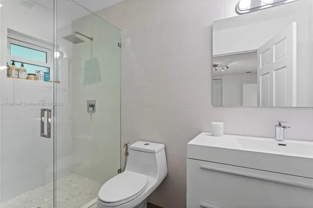 an outdoor space with swimming pool and furniture