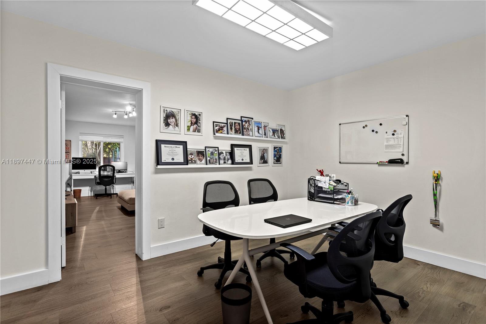 13551 Southwest 62nd Avenue Pinecrest, FL 33156 - Photo 48 of 70 a view of a dining room with furniture and wooden floor