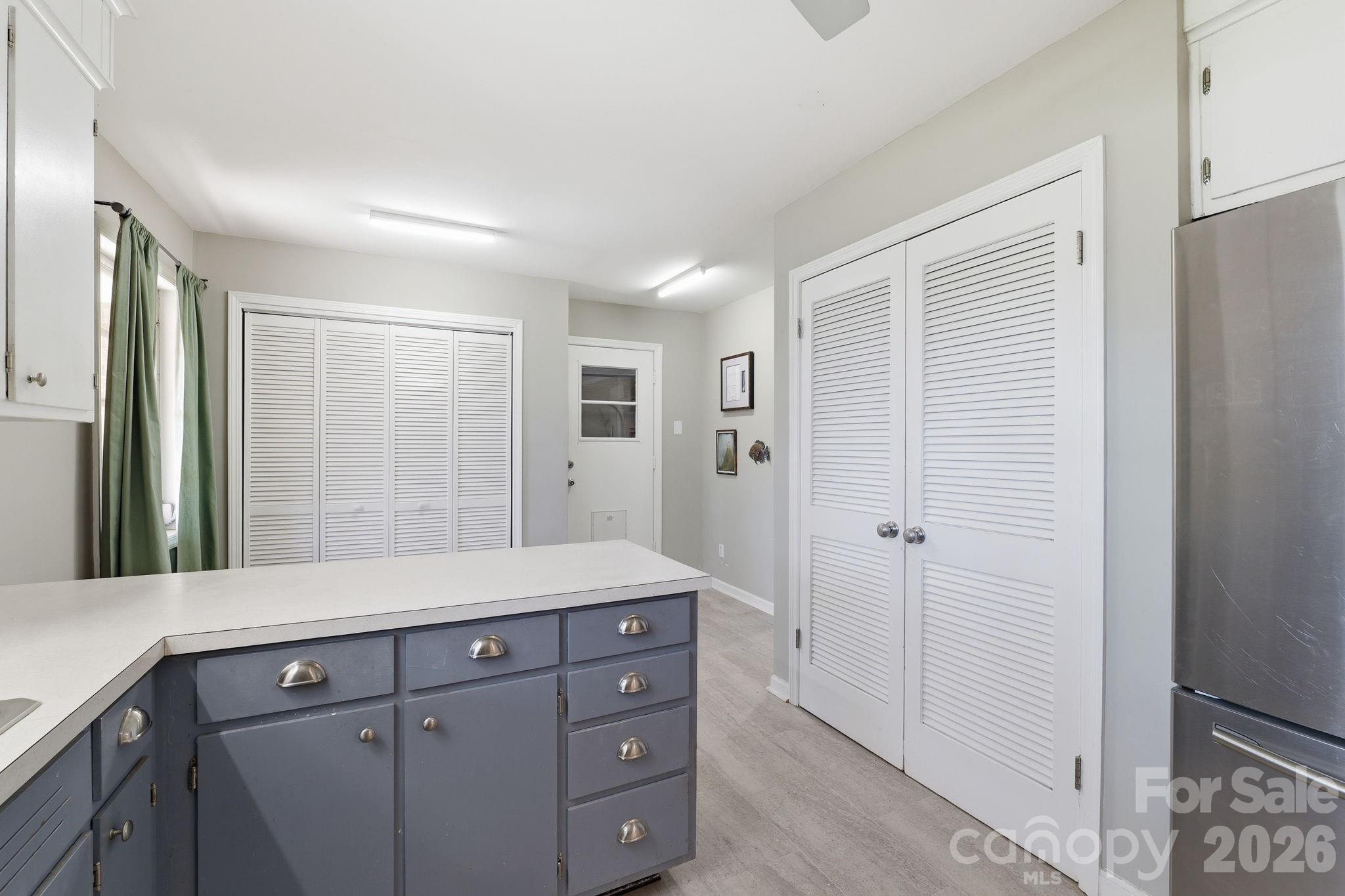 11715 Timber Ridge Road Charlotte, NC 28213 - Photo 15 of 38 a spacious bathroom with a shower sink and mirror