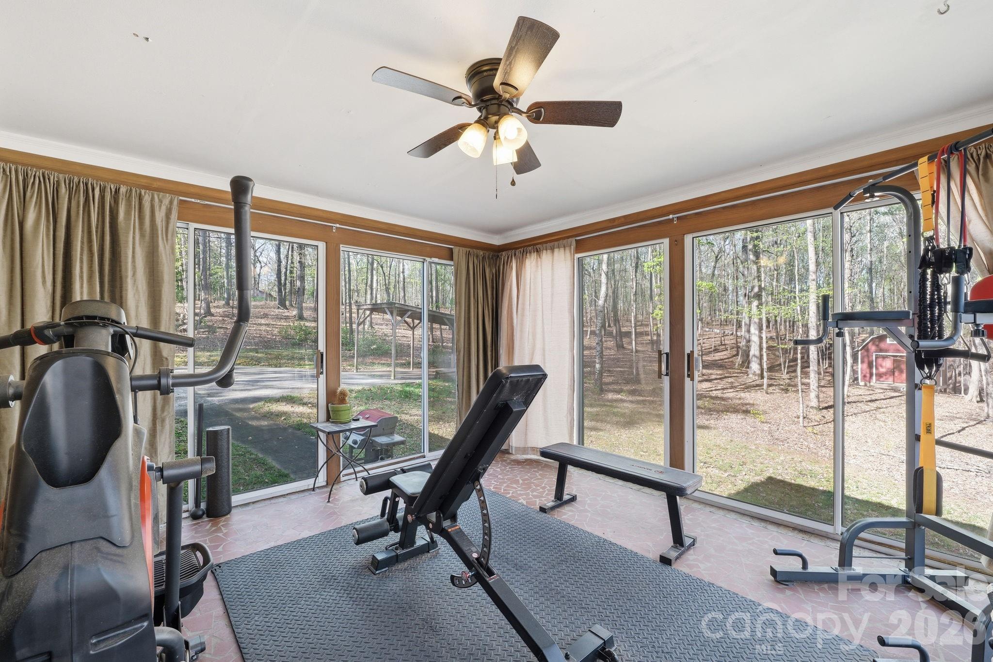 11715 Timber Ridge Road Charlotte, NC 28213 - Photo 20 of 38 a view of a room with gym equipment