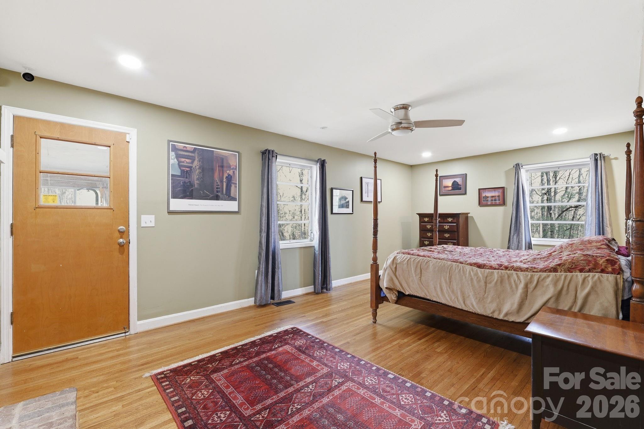 11715 Timber Ridge Road Charlotte, NC 28213 - Photo 23 of 38 a bed room with a bed and a window