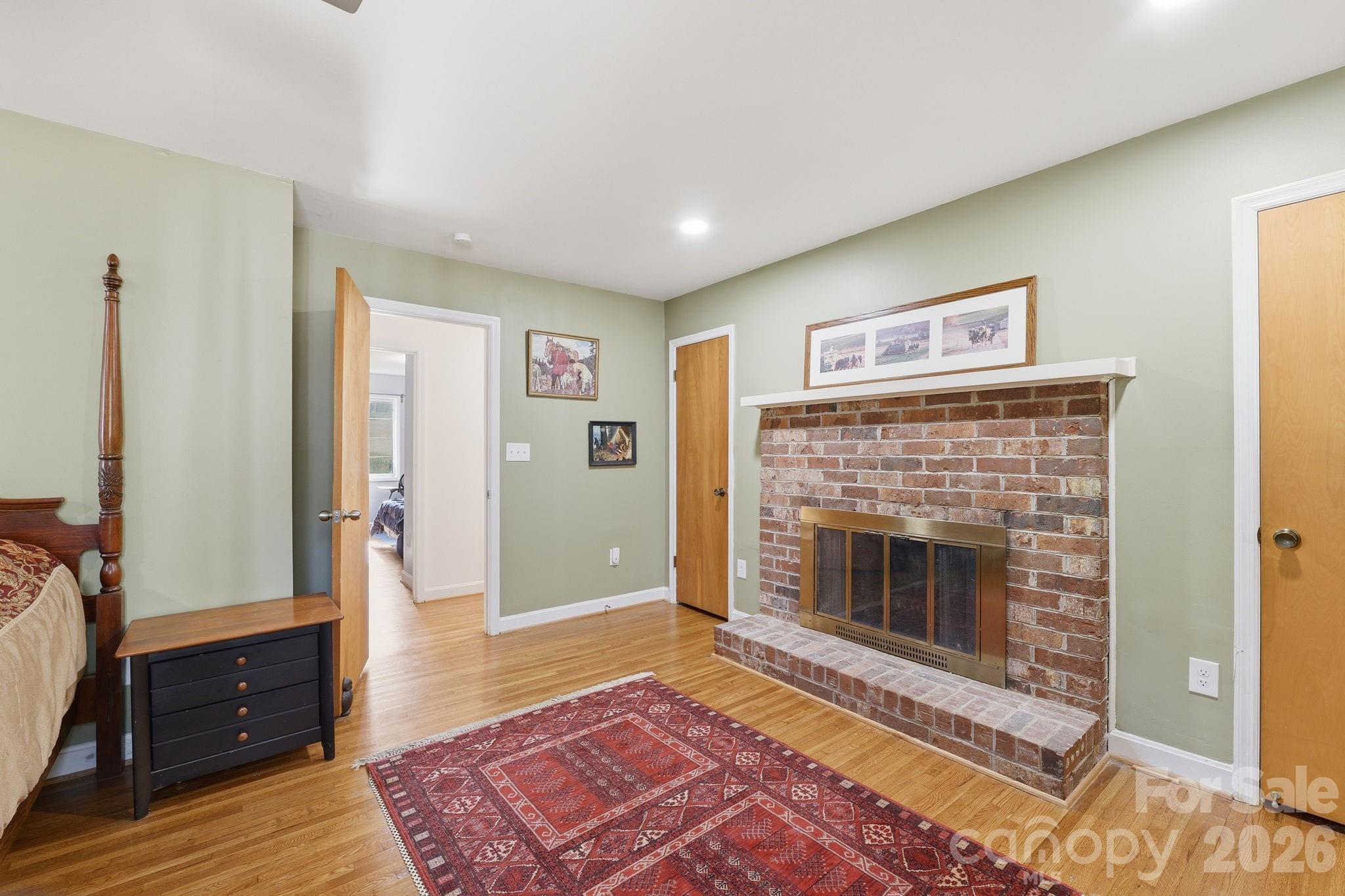 11715 Timber Ridge Road Charlotte, NC 28213 - Photo 25 of 38 a living room with furniture and a fireplace