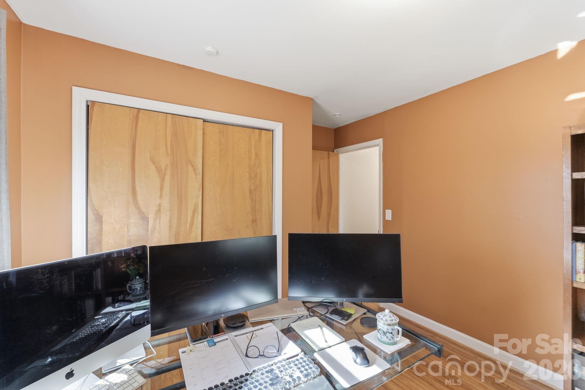 11715 Timber Ridge Road Charlotte, NC 28213 - Photo 28 of 38 a view of workspace with wooden floor