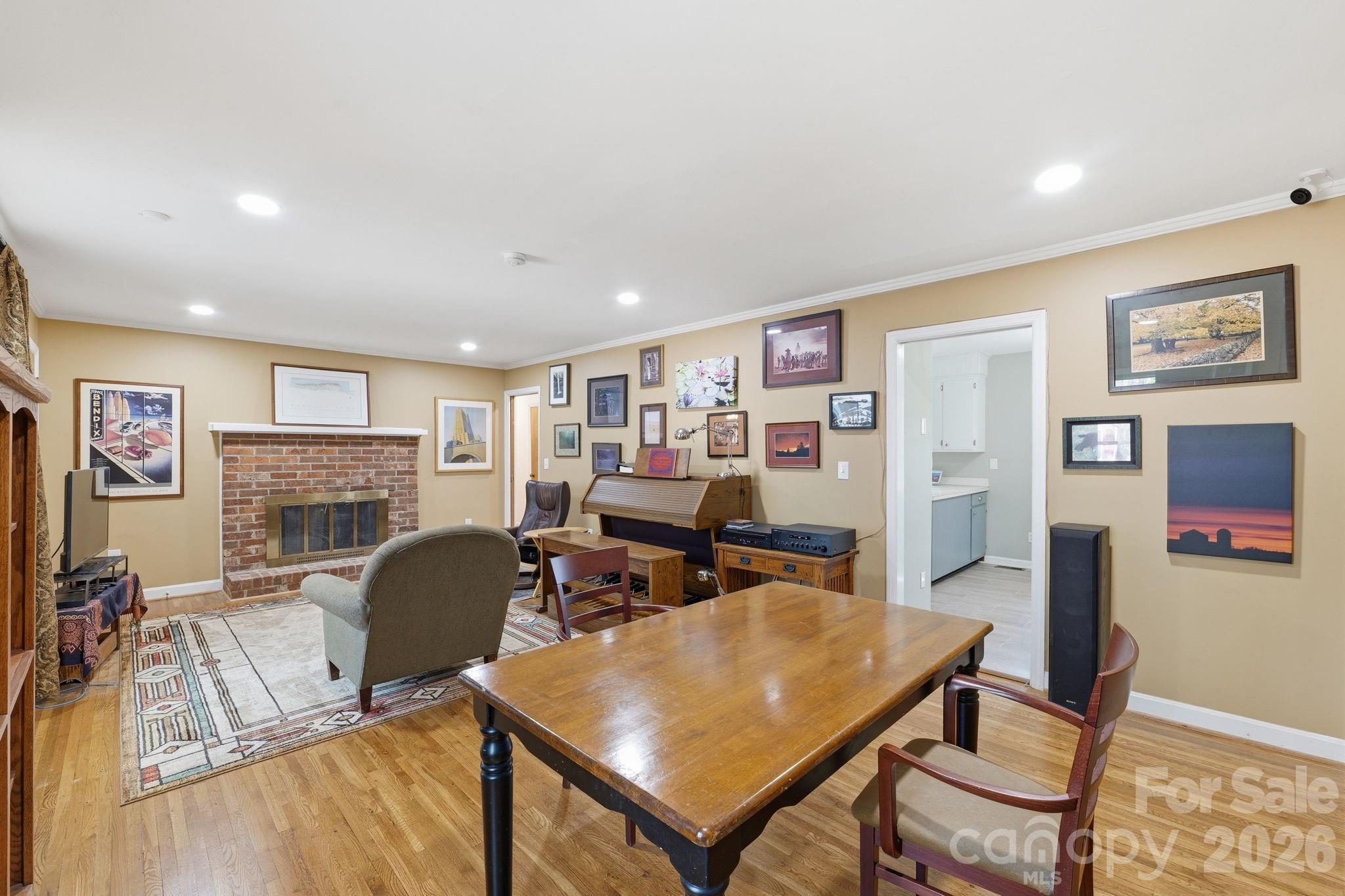 11715 Timber Ridge Road Charlotte, NC 28213 - Photo 3 of 38 a view of a livingroom with furniture and a flat screen tv