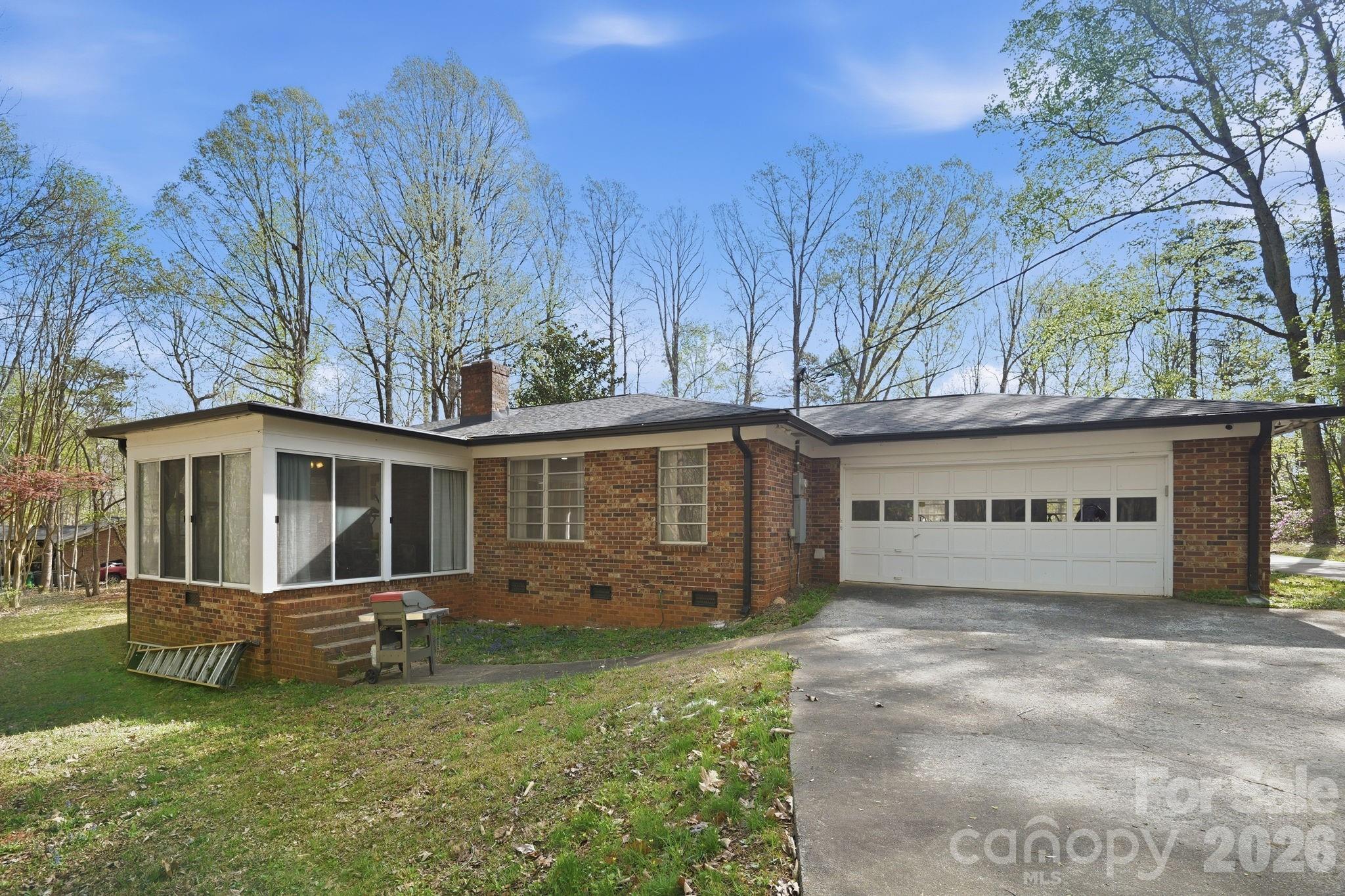 11715 Timber Ridge Road Charlotte, NC 28213 - Photo 36 of 38 a front view of a house with garden
