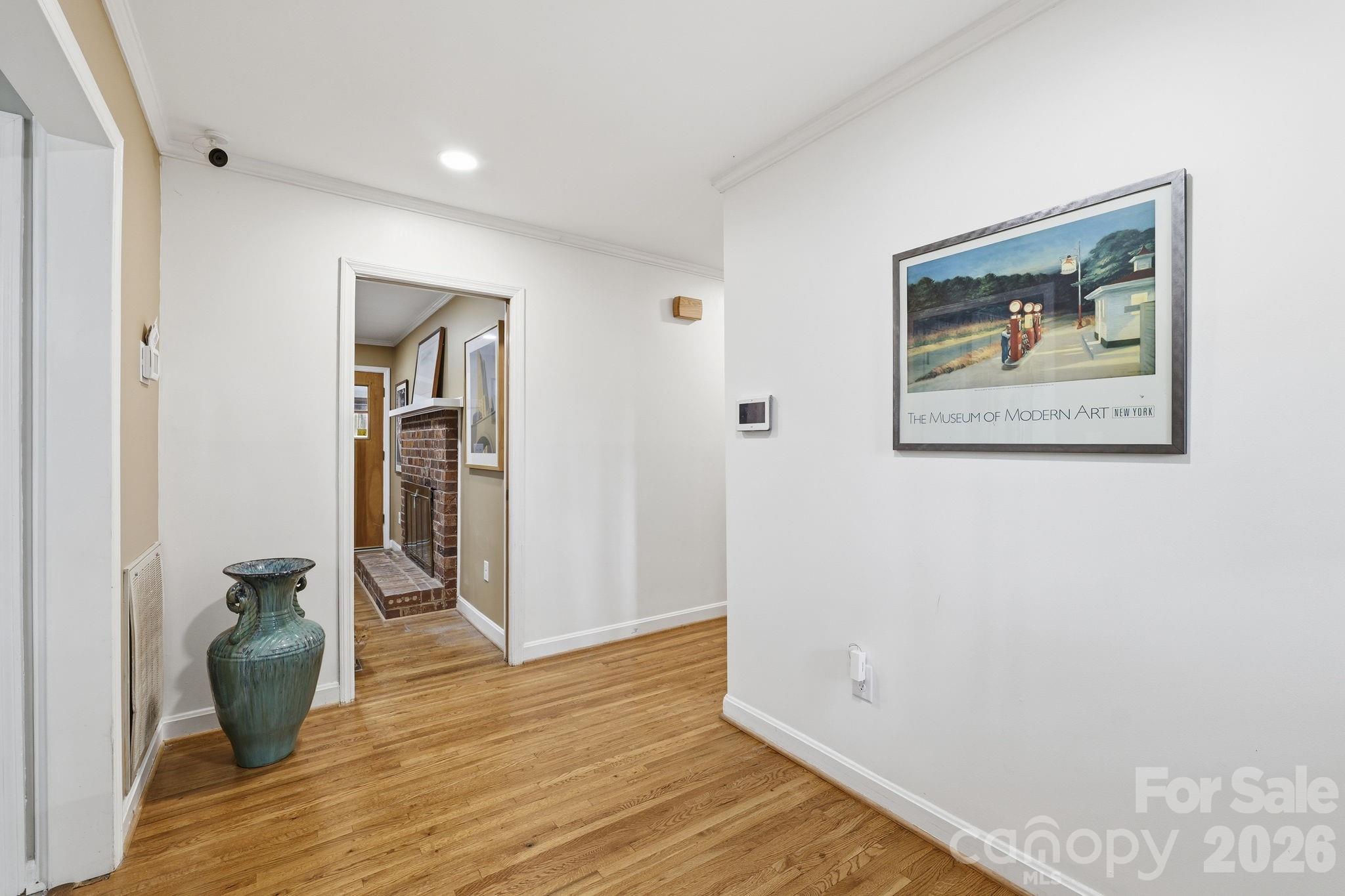 11715 Timber Ridge Road Charlotte, NC 28213 - Photo 8 of 38 a view of room with wooden floor