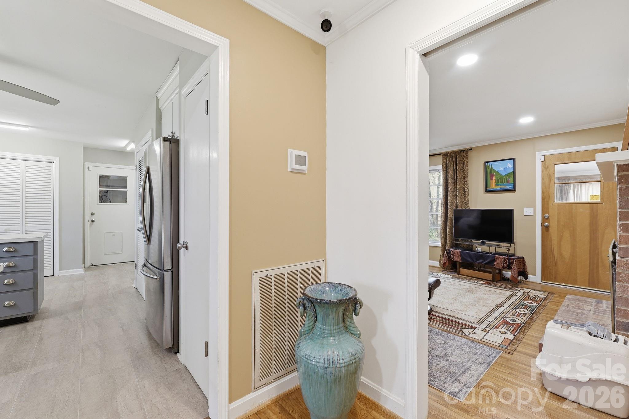 11715 Timber Ridge Road Charlotte, NC 28213 - Photo 9 of 38 a view of a livingroom with furniture and a flat screen tv