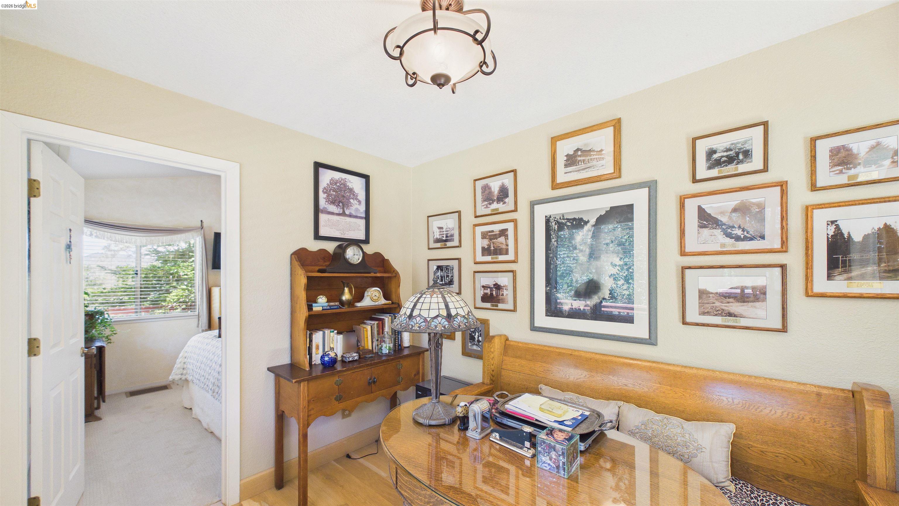 18102 Mt Eaton Road Tuolumne, CA 95379 - Photo 23 of 44 Hardwood flooring and light-toned walls create a neutral backdrop