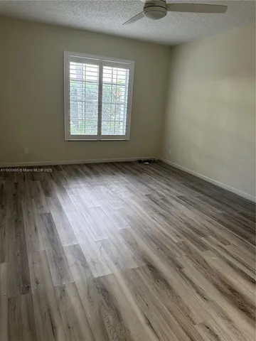 a bathroom with a sink a toilet and a bathtub
