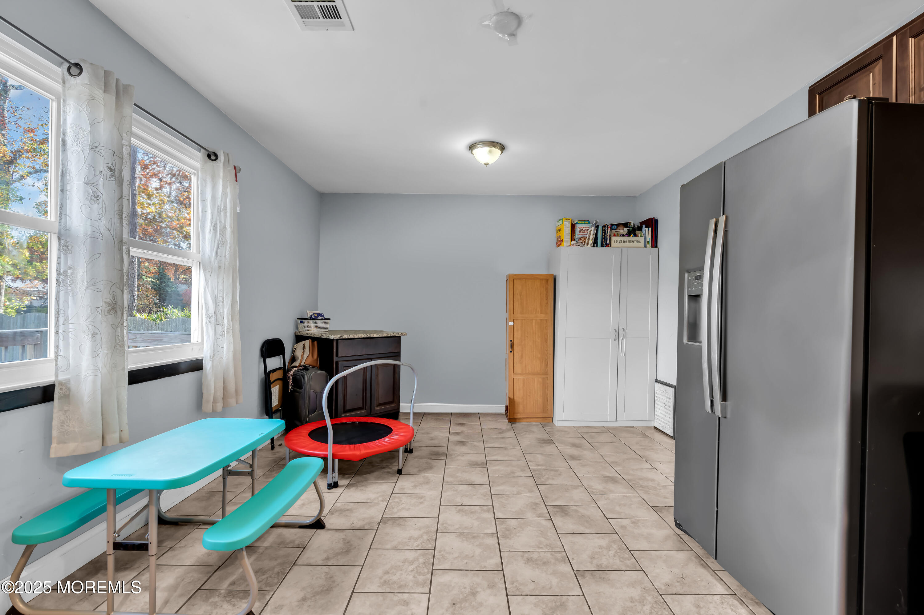355 Western Boulevard Bayville, NJ 08721 - Photo 12 of 39 a room with furniture and a window