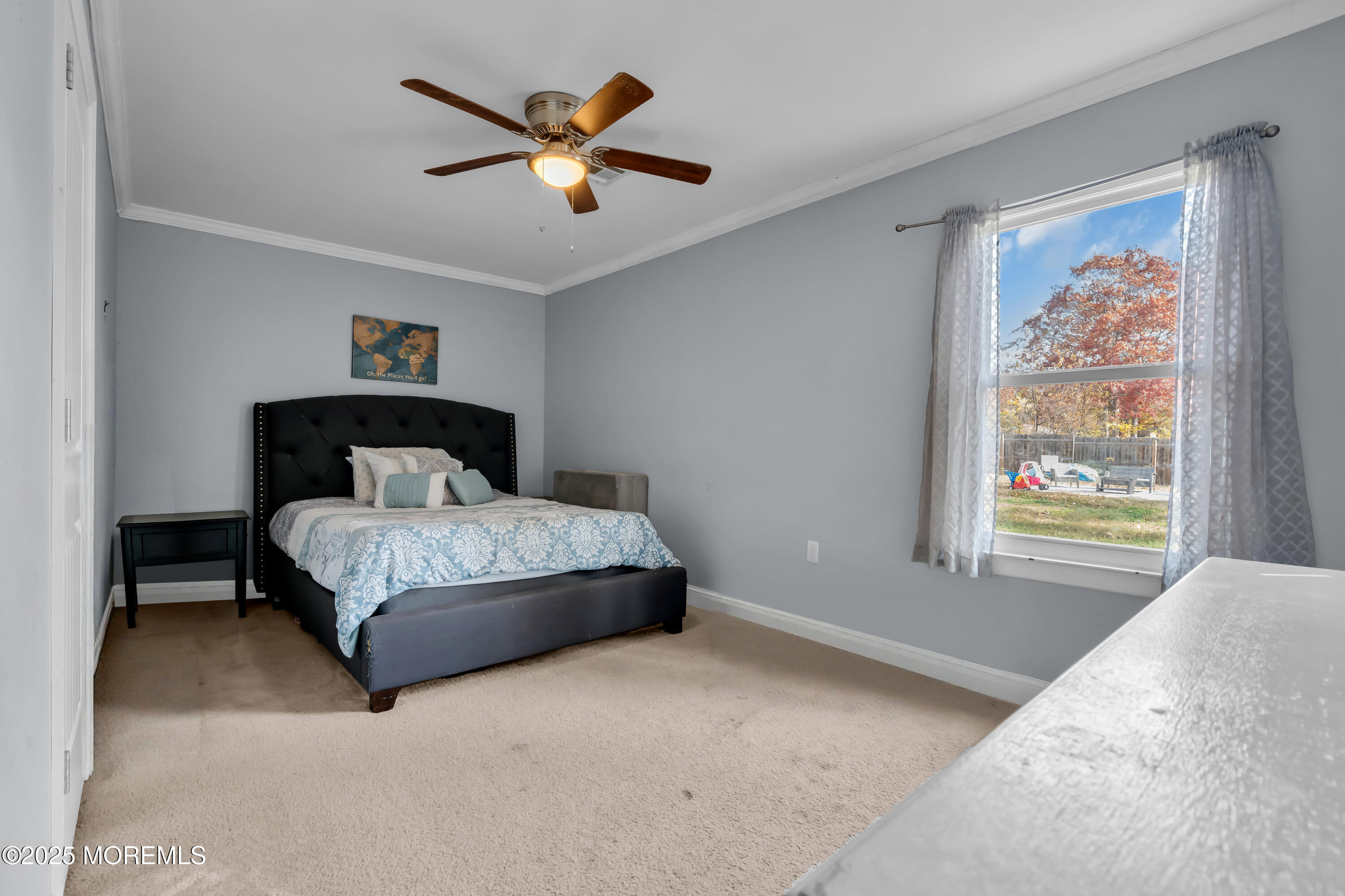 355 Western Boulevard Bayville, NJ 08721 - Photo 14 of 39 a bedroom with a large bed and a window