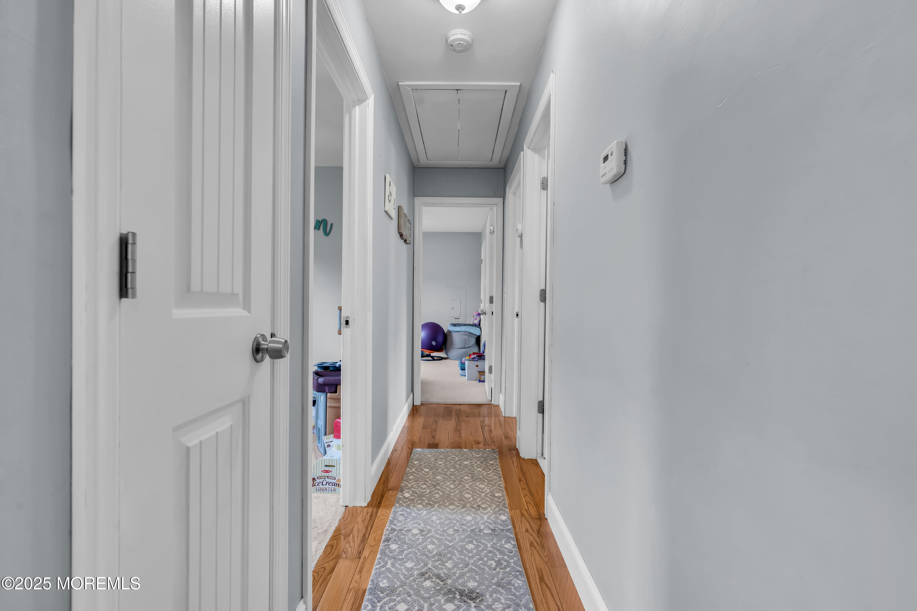 355 Western Boulevard Bayville, NJ 08721 - Photo 18 of 39 a view of a hallway with a white walls
