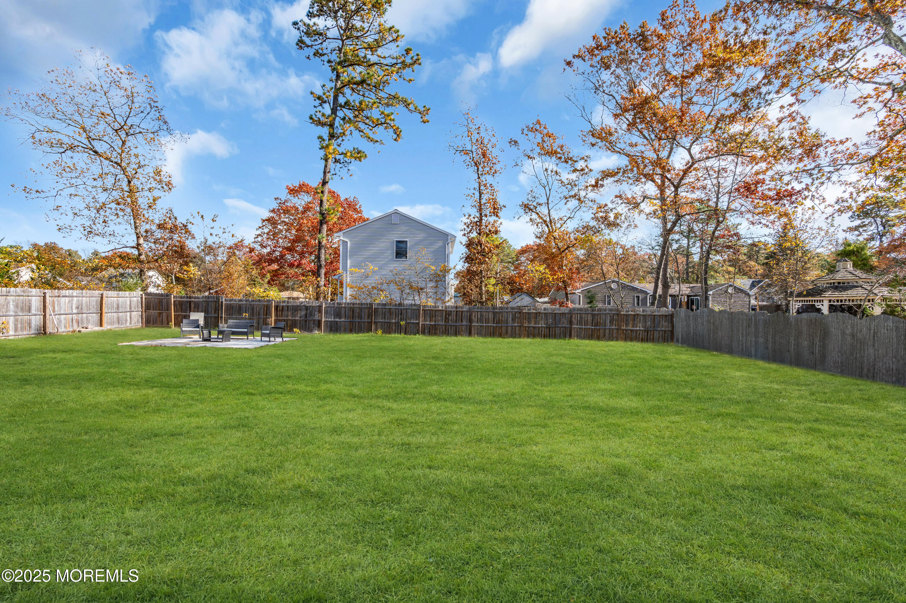 355 Western Boulevard Bayville, NJ 08721 - Photo 25 of 39 a view of yard with grass and trees