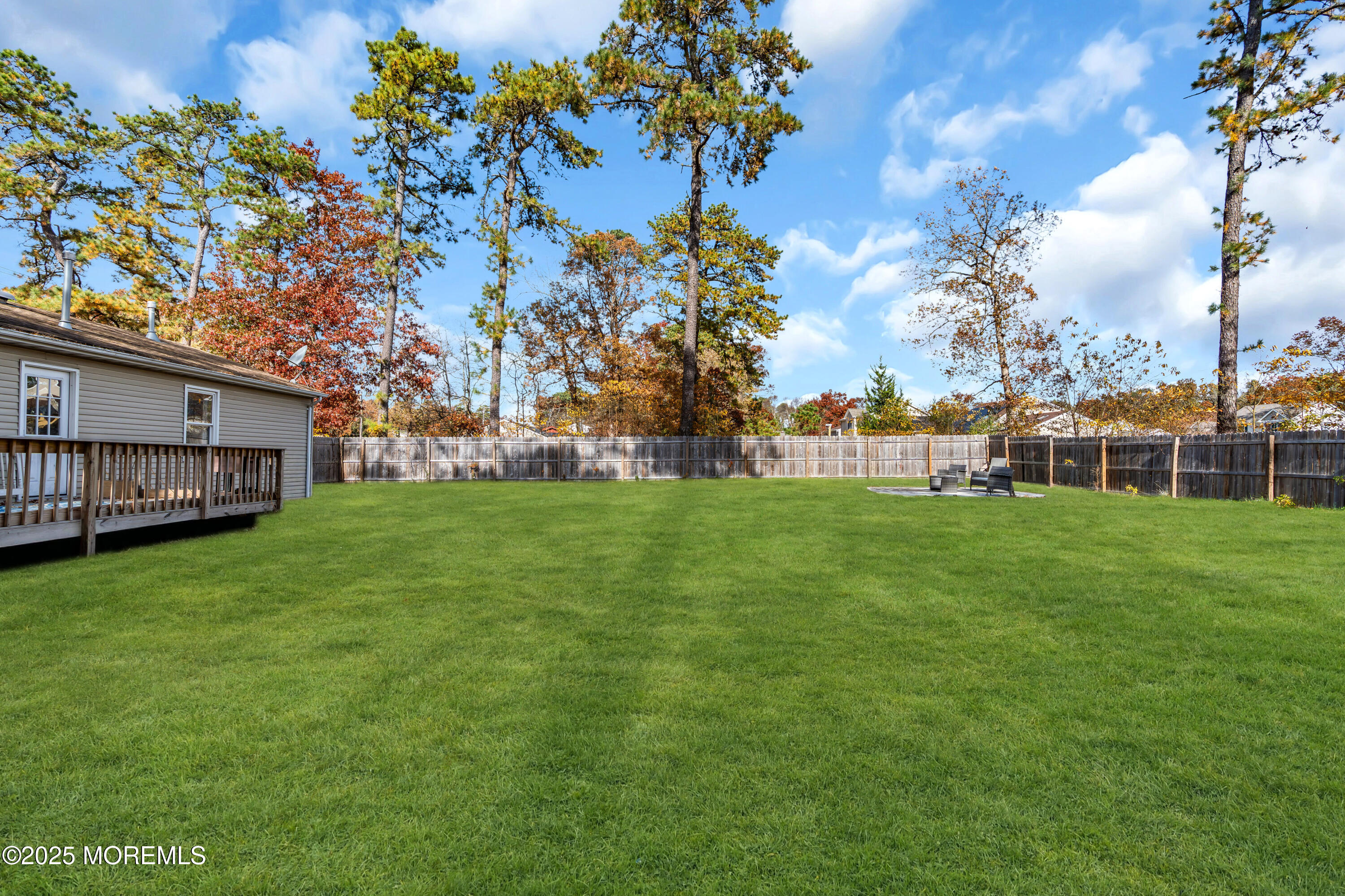 355 Western Boulevard Bayville, NJ 08721 - Photo 28 of 39 a view of yard with swimming pool and green space