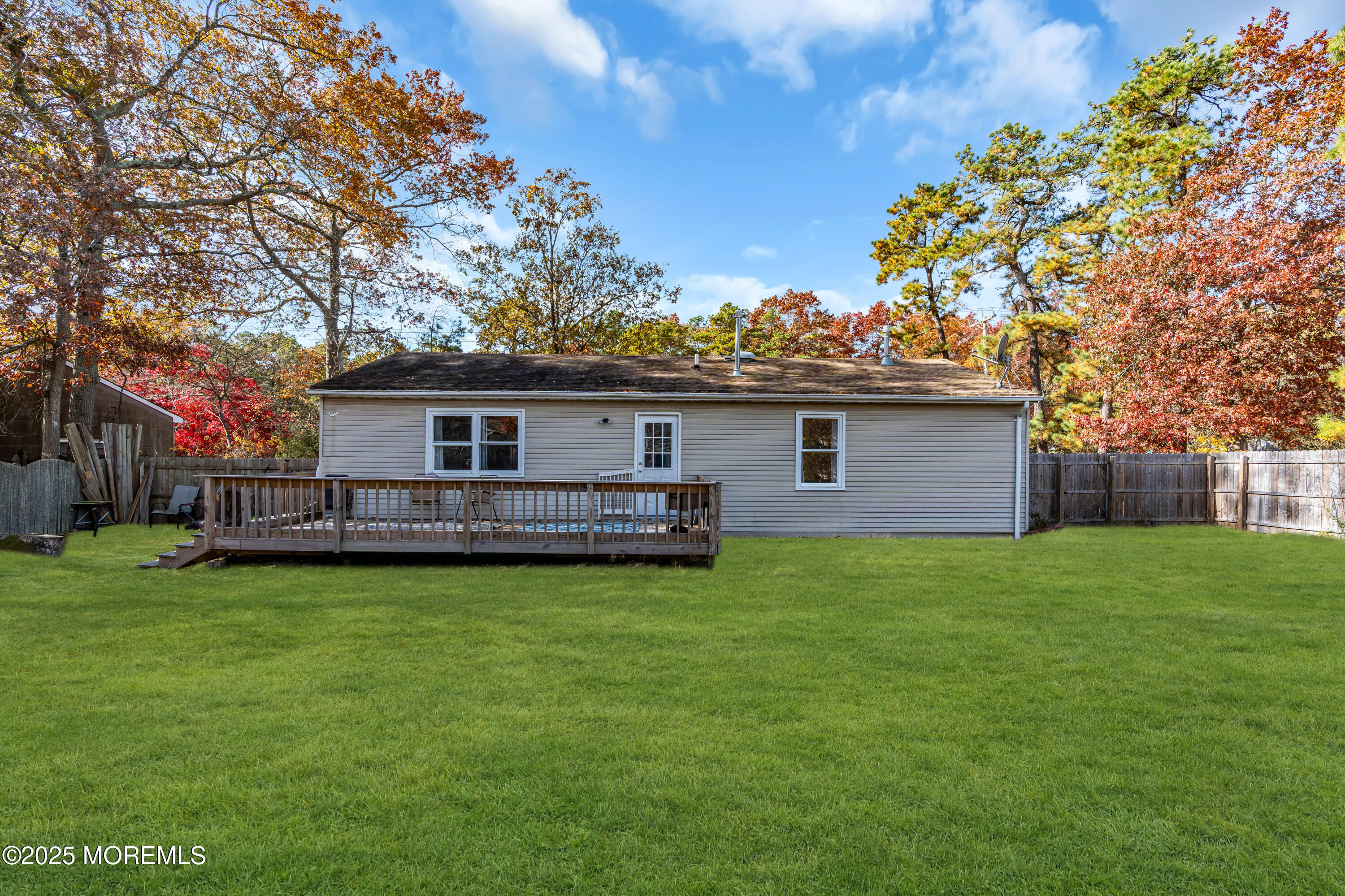 355 Western Boulevard Bayville, NJ 08721 - Photo 30 of 39 a view of a house with a yard and sitting area