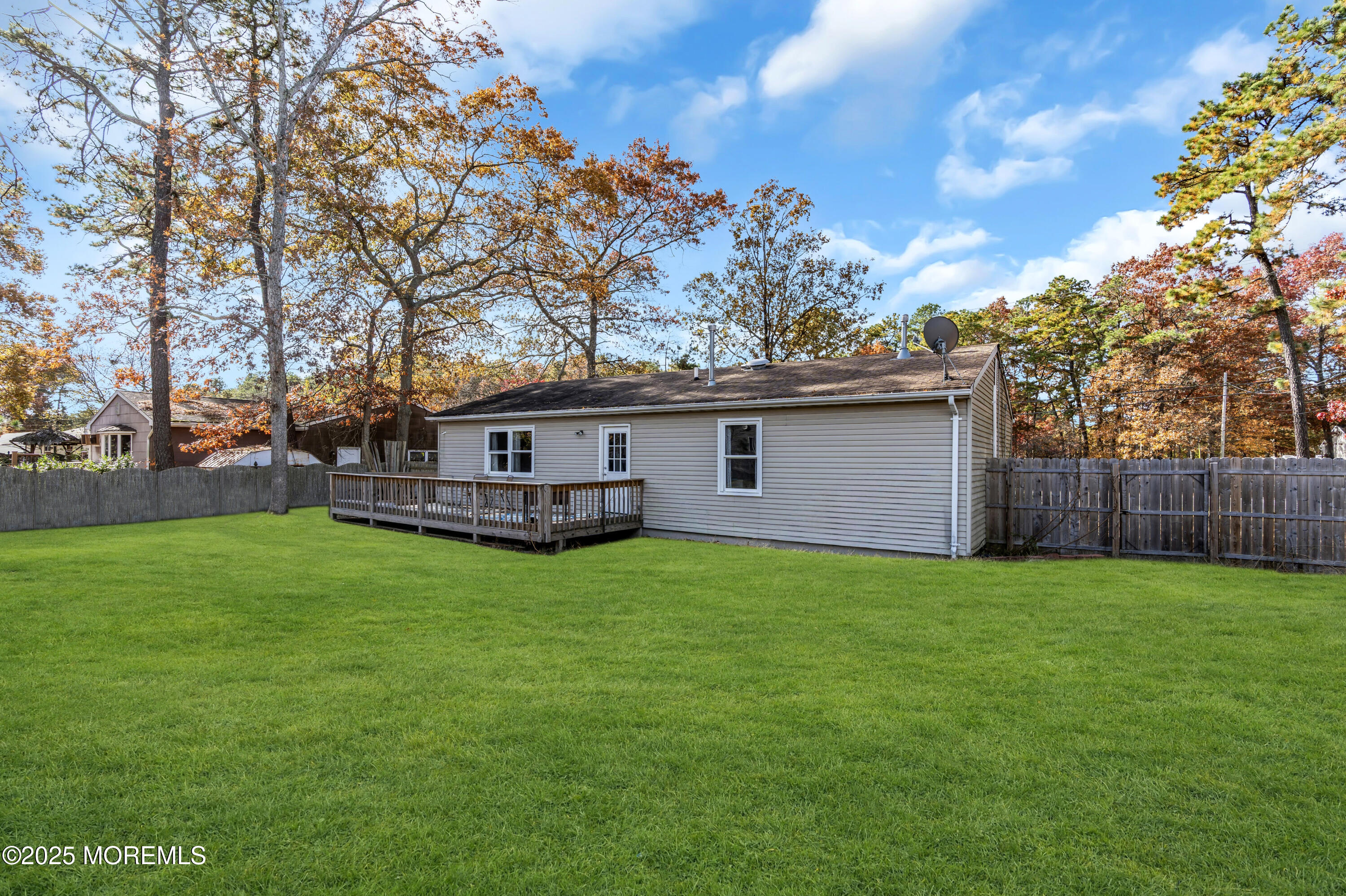 355 Western Boulevard Bayville, NJ 08721 - Photo 31 of 39 a view of a backyard with a garden