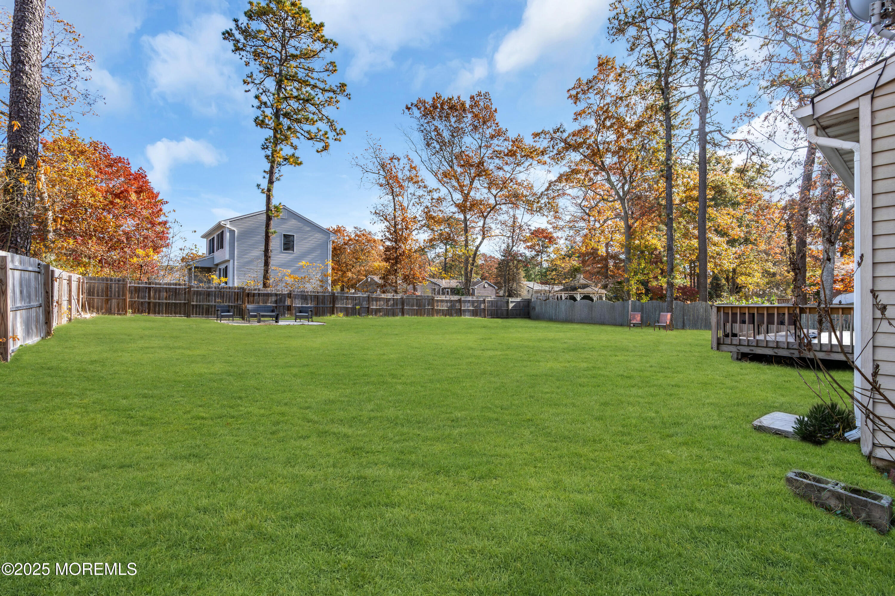 355 Western Boulevard Bayville, NJ 08721 - Photo 32 of 39 a front view of a house with garden