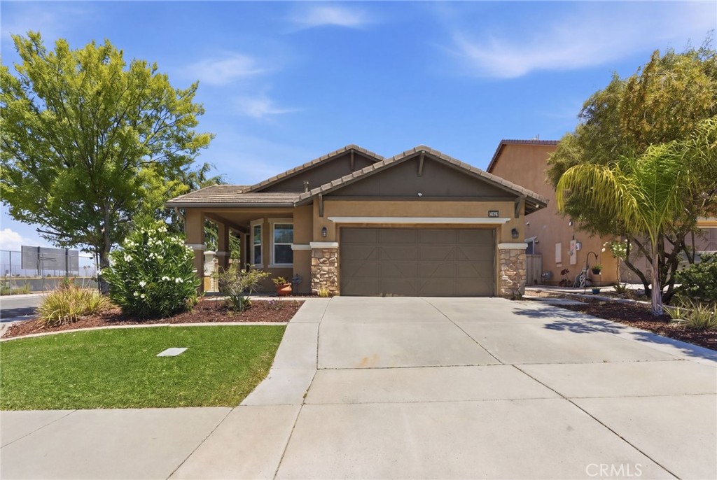 32634 Ritchart Court Temecula, CA 92592 - Photo 2 of 22 a front view of a house with a yard