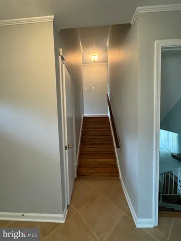 a view of gallery with stairs