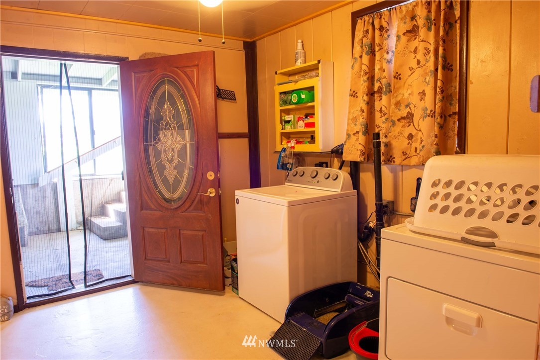 78 Mundy Road Twisp, WA 98856 - Photo 19 of 40 a utility room with dryer and washer