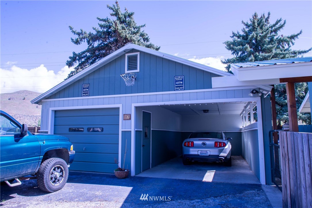 78 Mundy Road Twisp, WA 98856 - Photo 3 of 40 a car parked in front of a building