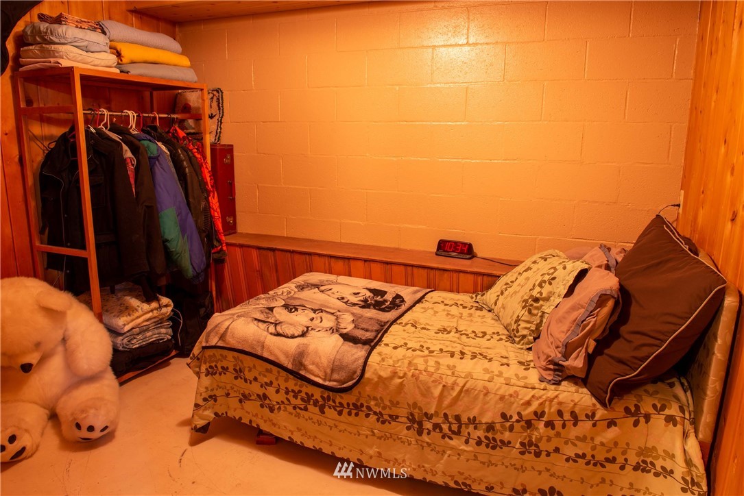 78 Mundy Road Twisp, WA 98856 - Photo 23 of 40 a view of walk in closet with clothes and shoes