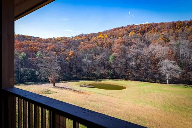a kitchen with stainless steel appliances granite countertop a stove and cabinets