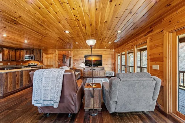a bathroom with a tub and shower