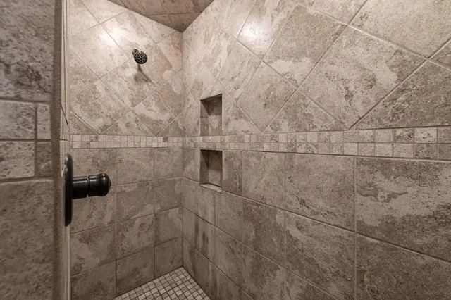 a view of balcony with wooden floor