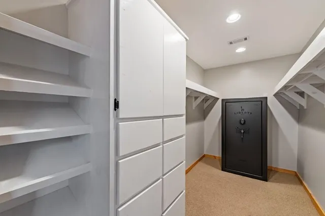 a view of outdoor space with wooden deck and furniture