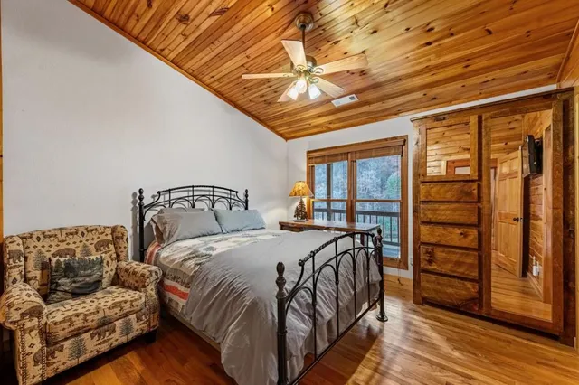 a view of a house with a yard and plant