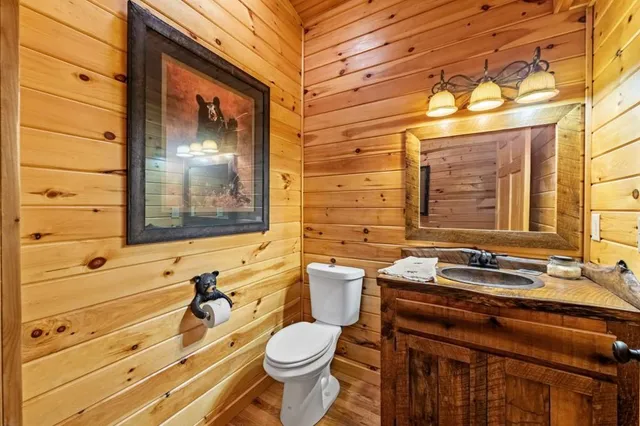 a view of an ocean with a house in the background