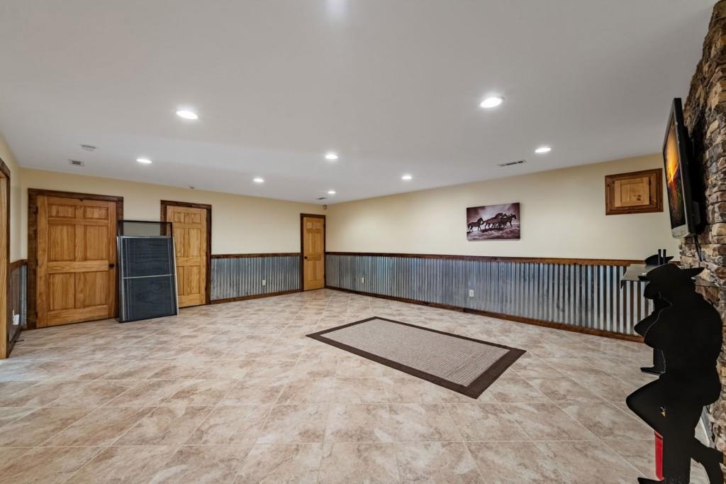 908 Cashes Valley Road Cherry Log, GA 30522 - Photo 52 of 90 a view of an empty room with wooden floor