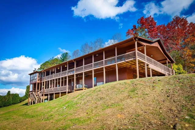 a view of a porch with wooden floor and outdoor space