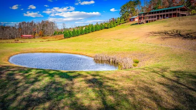 $820,000 | 908 Cashes Valley Road, Cherry Log, GA 30522