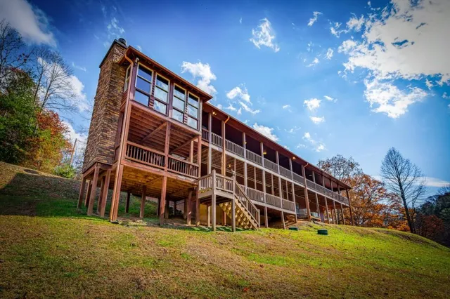 a view of a swimming pool with a yard