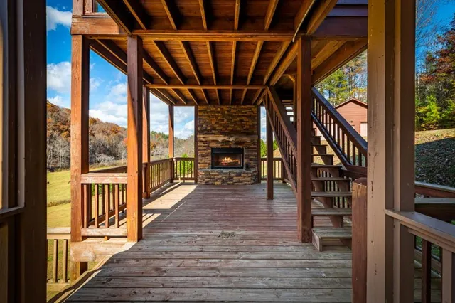 a kitchen with a sink cabinets and wooden floor