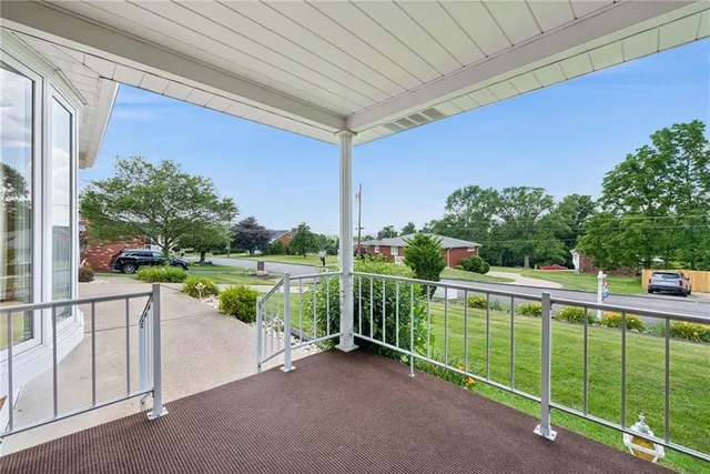 a view of a balcony with lake view