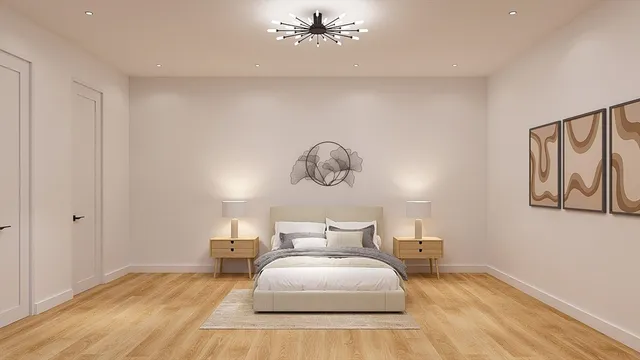 a bedroom with bed and wooden floor