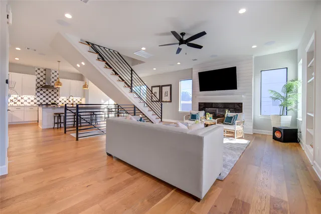 a view of a balcony with wooden floor
