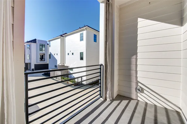 a bathroom with a double vanity sink toilet mirror and bathtub