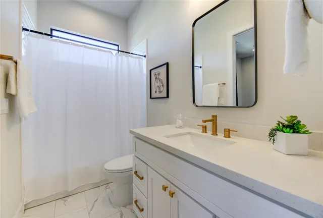 a view of a back yard with an outdoor space