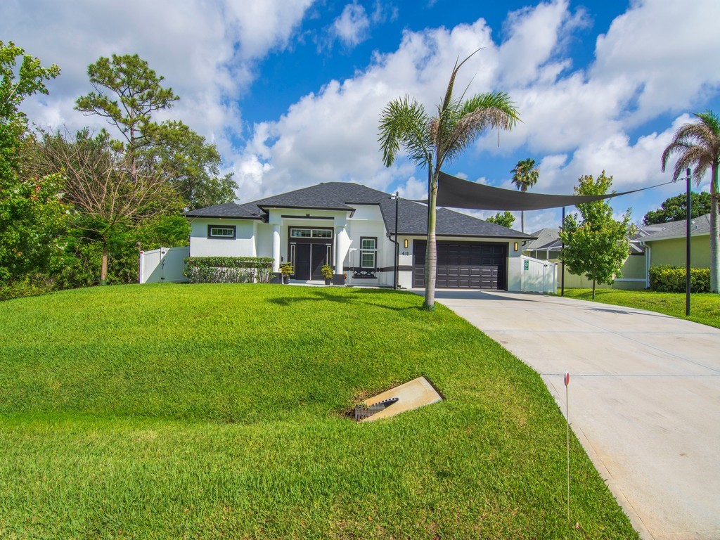 431 Midvale Terrace Sebastian, FL 32958 - Photo 2 of 34 a view of house with a yard