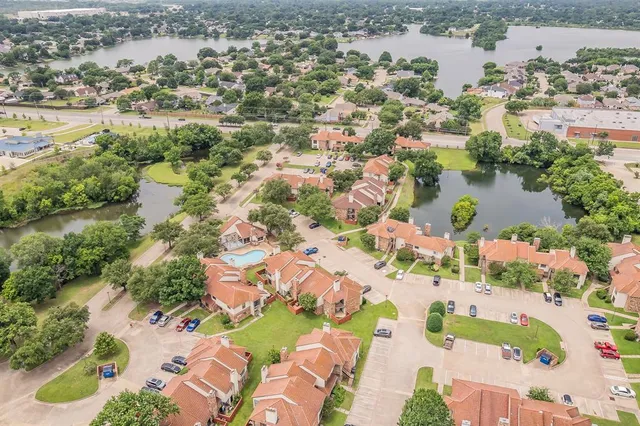an aerial view of residential house with outdoor space