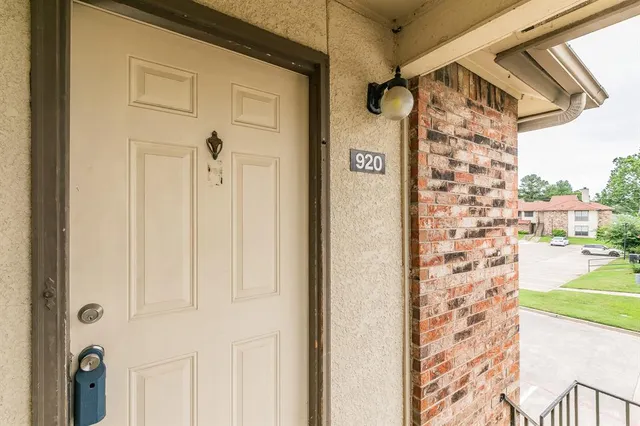 a view of a door and a window