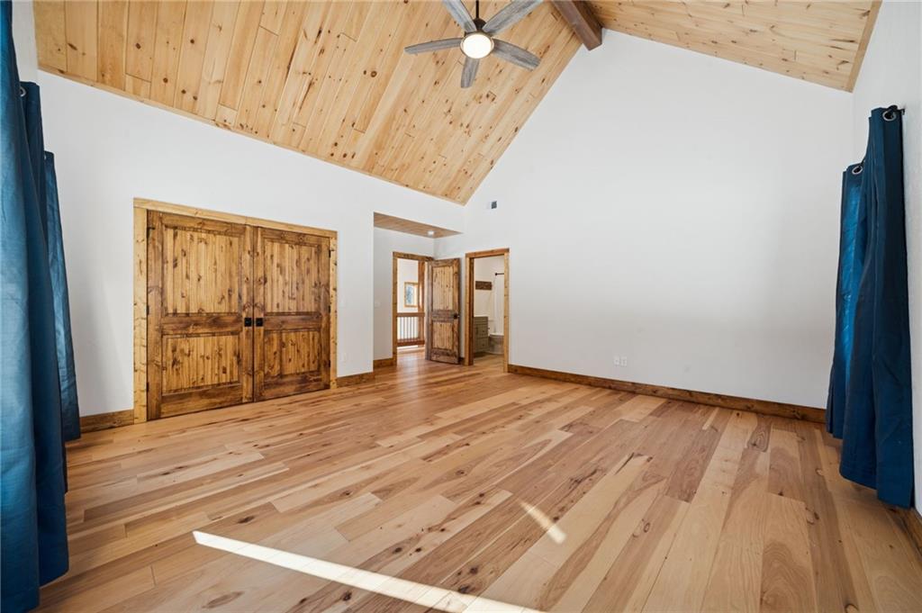 223 Deer Fern Drive Somerset, PA 15501 - Photo 27 of 37 a view of an empty room with wooden floor and a window