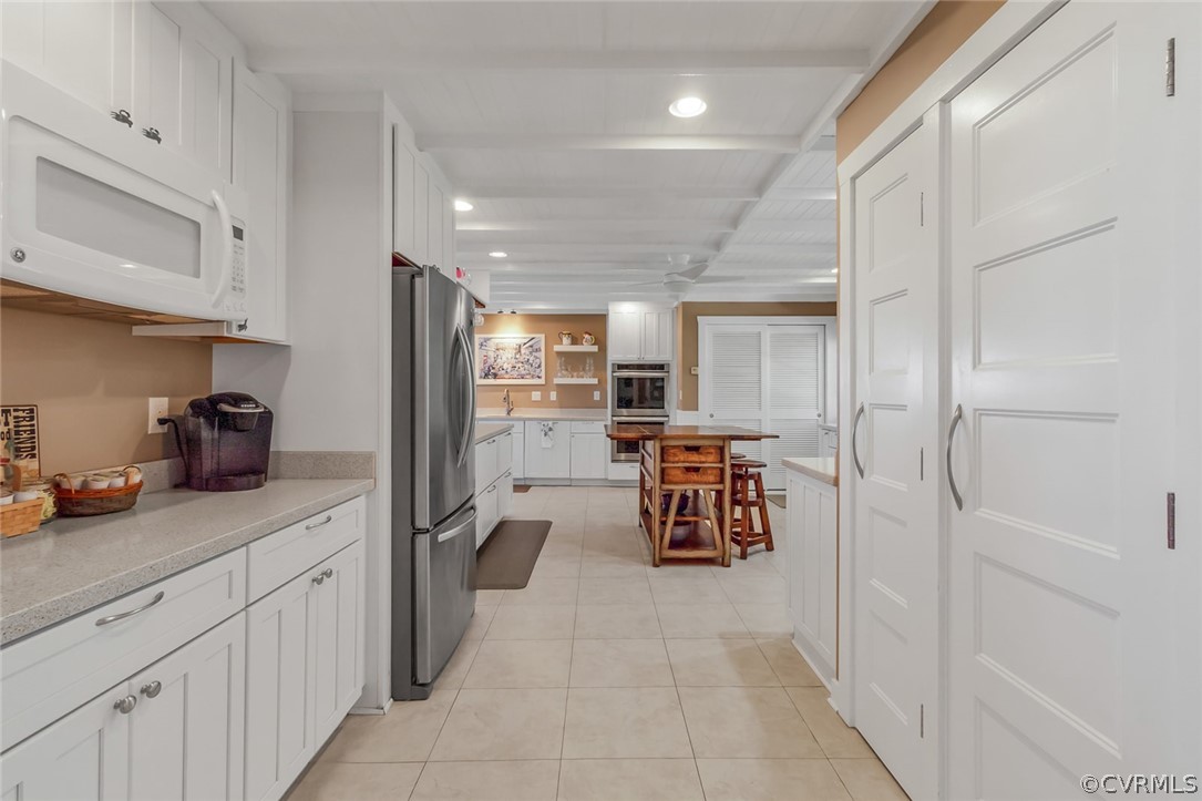 324 Fleet Road Heathsville, VA 22473 - Photo 14 of 49 a kitchen with stainless steel appliances a refrigerator and a sink